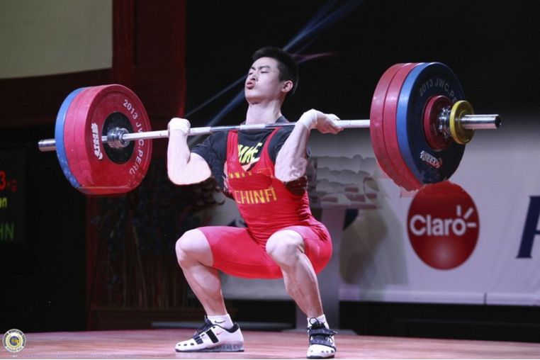 Штанга DHS L220 см D50мм Olympic для соревнований 190 кг (IWF) фото 2